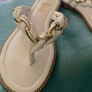 White and gold flat slip on sandals